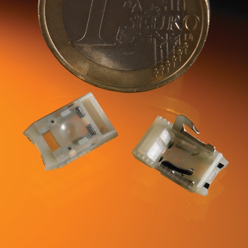 Small plastic part with metal insert